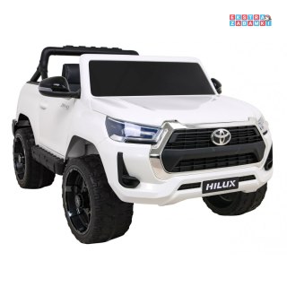Biała Toyota Hilux na akumulator - 4x45W, 12V/14Ah, ekoskóra, EVA, panel audio - [DK-HL860]