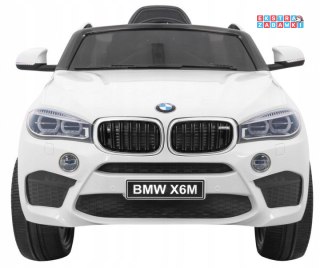 Białe BMW X6M na akumulator - 2x45W, 12V/7Ah, pilot, EVA, audio, LED - [JJ2199]