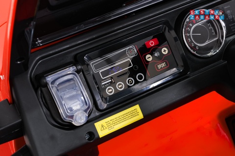 Pomarańczowy Jeep Wrangler Rubicon LIFT modelu JWR555 na akumulator - 4x200W 24V/7Ah, ekoskóra, EVA, Bluetooth, pilot [JWR556]
