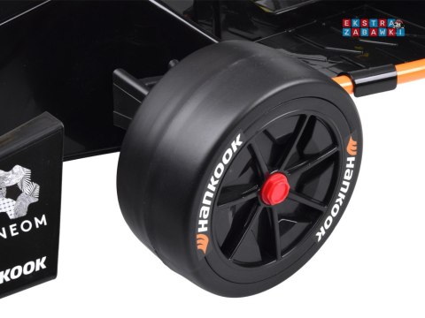 Bolid Formuła E McLaren NEOM na akumulator - pomarańczowy, 2x45W 12V/7Ah, pilot, EVA, pas, ekoskóra, panel muzyczny [PA0346]