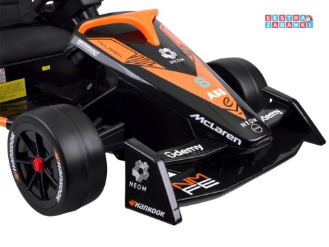 Bolid Formuła E McLaren NEOM na akumulator - pomarańczowy, 2x45W 12V/7Ah, pilot, EVA, pas, ekoskóra, panel muzyczny [PA0346]