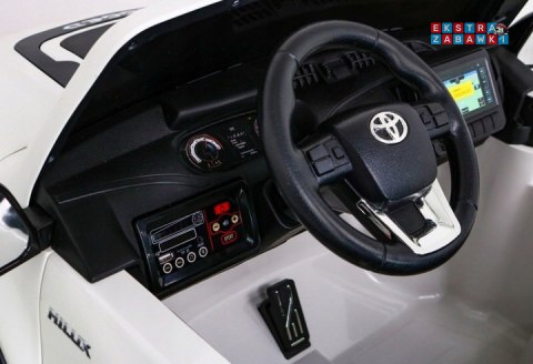 Biała Toyota Hilux na akumulator - 4x200W 24V/7Ah, ekoskóra, LED, EVA, pilot [HL850]