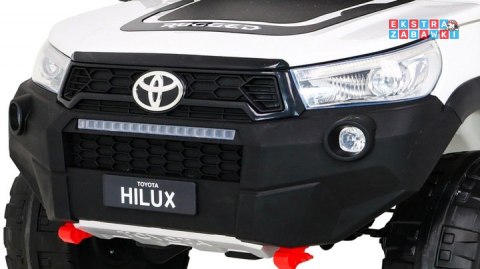 Biała Toyota Hilux na akumulator - 4x200W 24V/7Ah, ekoskóra, LED, EVA, pilot [HL850]
