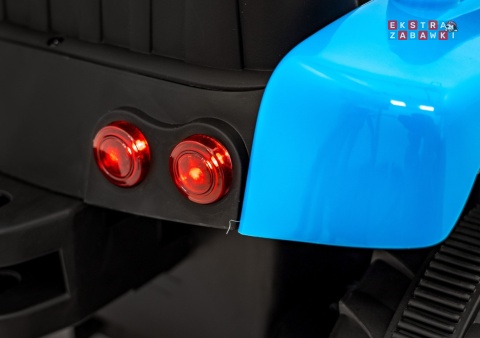 Traktor z przyczepą New Holland T7 na akumulator - niebieski, 2x35W 12V/7Ah, panel muzyczny, LED, AUX [A009B]