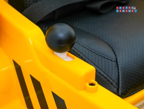 Wywrotka Caterpillar na akumulator - żółty, 2x35W 12V/4.5Ah, ruchomy kiper, łopatka, megafon, audio, LED, ekoskóra [PA.901]